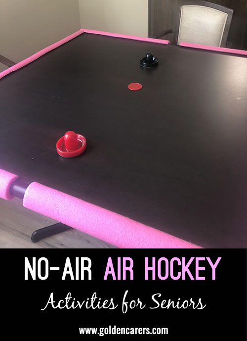 Turn any regular table into an air hockey-like game, minus the air, with these straightforward steps: